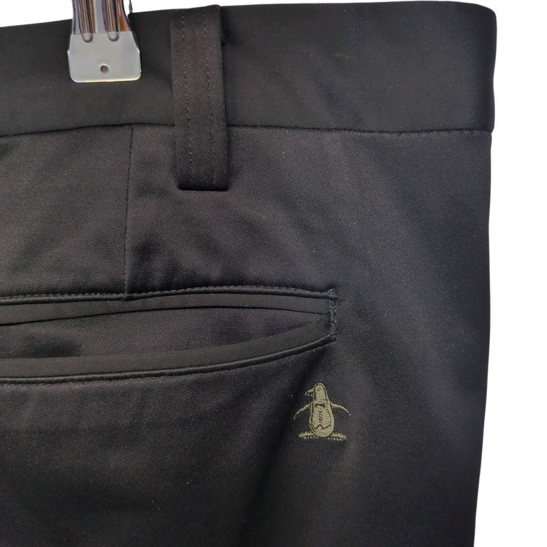 良品 マンシングウェア Munsingwear スラックス 100 黒 蓄熱